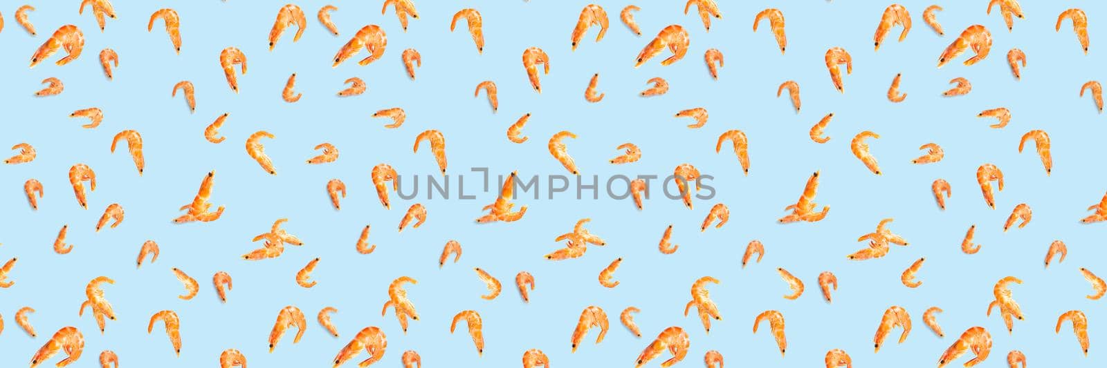 Tiger shrimp. Seafood background made from Prawns isolated on a blue backdrop. modern background from boiled shrimps, Seafood. not seamless pattern by PhotoTime