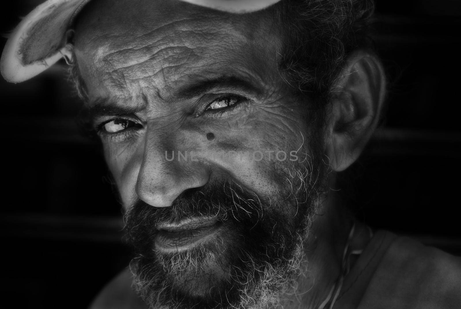 BENES, CUBA, OCTOBER 13, 2010: An elderly local Cuban man rests in the shade from the heat of the hot weather in Benes, Cuba.