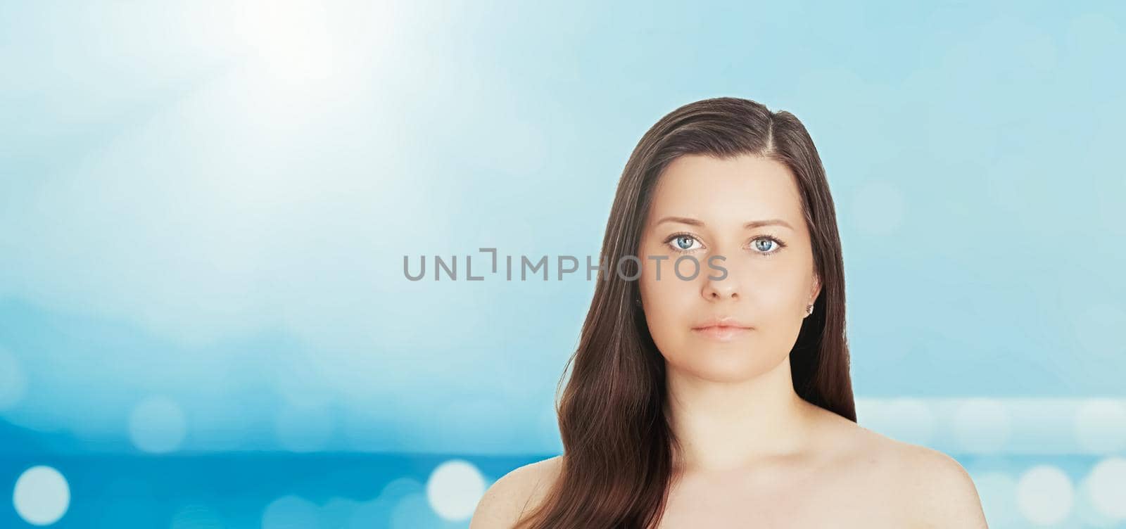 Skincare and sun protection in summer. Portrait of a beautiful young suntanned woman, blue sea and sky on background, beauty, wellness and travel concept by Anneleven