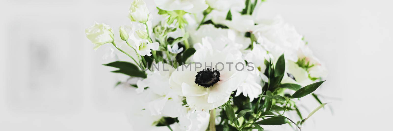 Bouquet of flowers in vase and home decor details, luxury interior design closeup