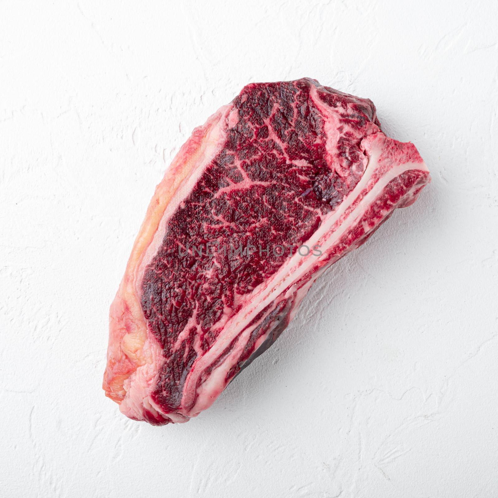 Beef on bone steak on white background