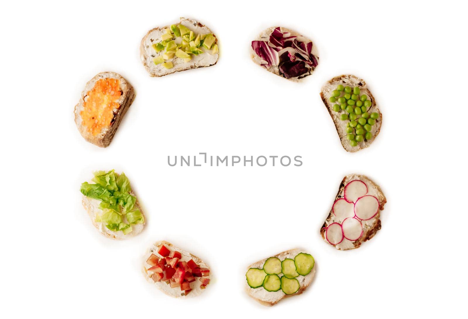 Mini sandwich set with french baguette, cheese, fish and avocado on white background top view mock up.Copy space for your text