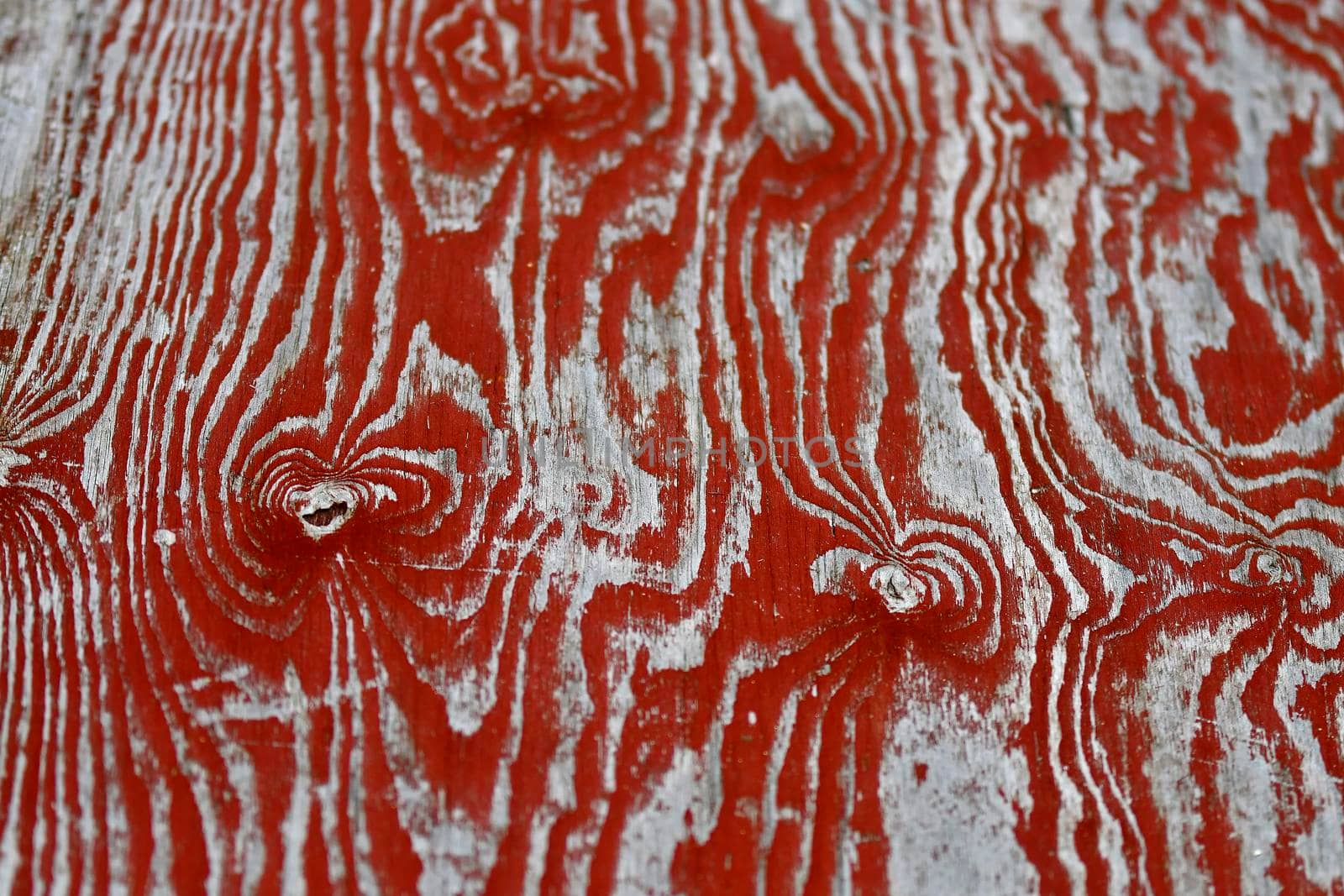 old red plank with chipped color remains