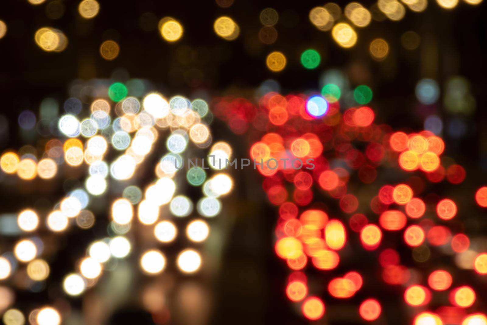 Rush hour in the city. Abstract blur night traffic background