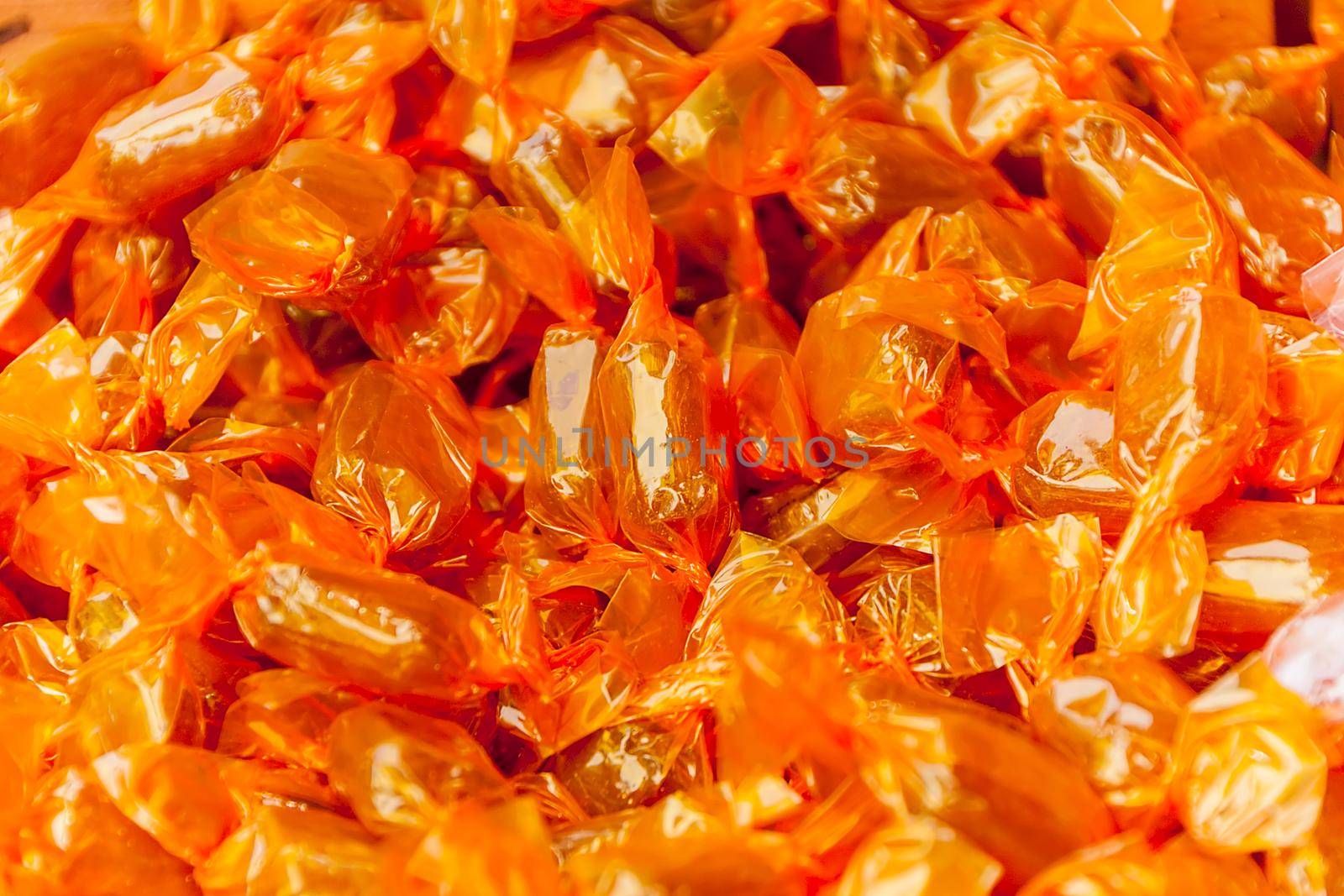Orange caramels closeup on a craftsmen's market