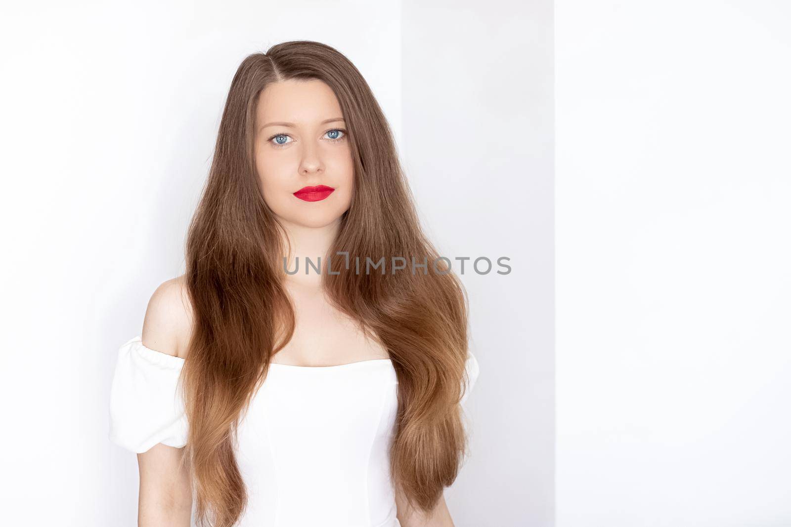 Beautiful woman with healthy gorgeous long hair, natural brunette hairstyle and red lipstick makeup, haircare and beauty ad by Anneleven