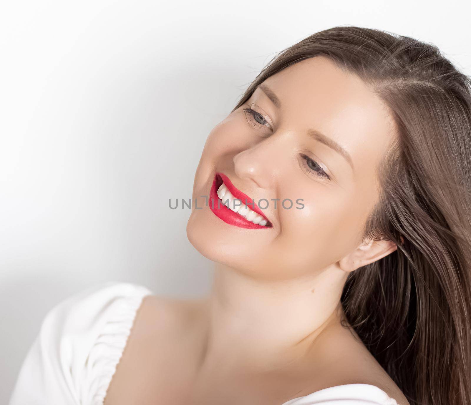 Happy smiling young woman with perfect white teeth and beautiful healthy smile, clean skin and natural makeup, female face portrait with positive emotion, beauty, wellness and skincare ad by Anneleven
