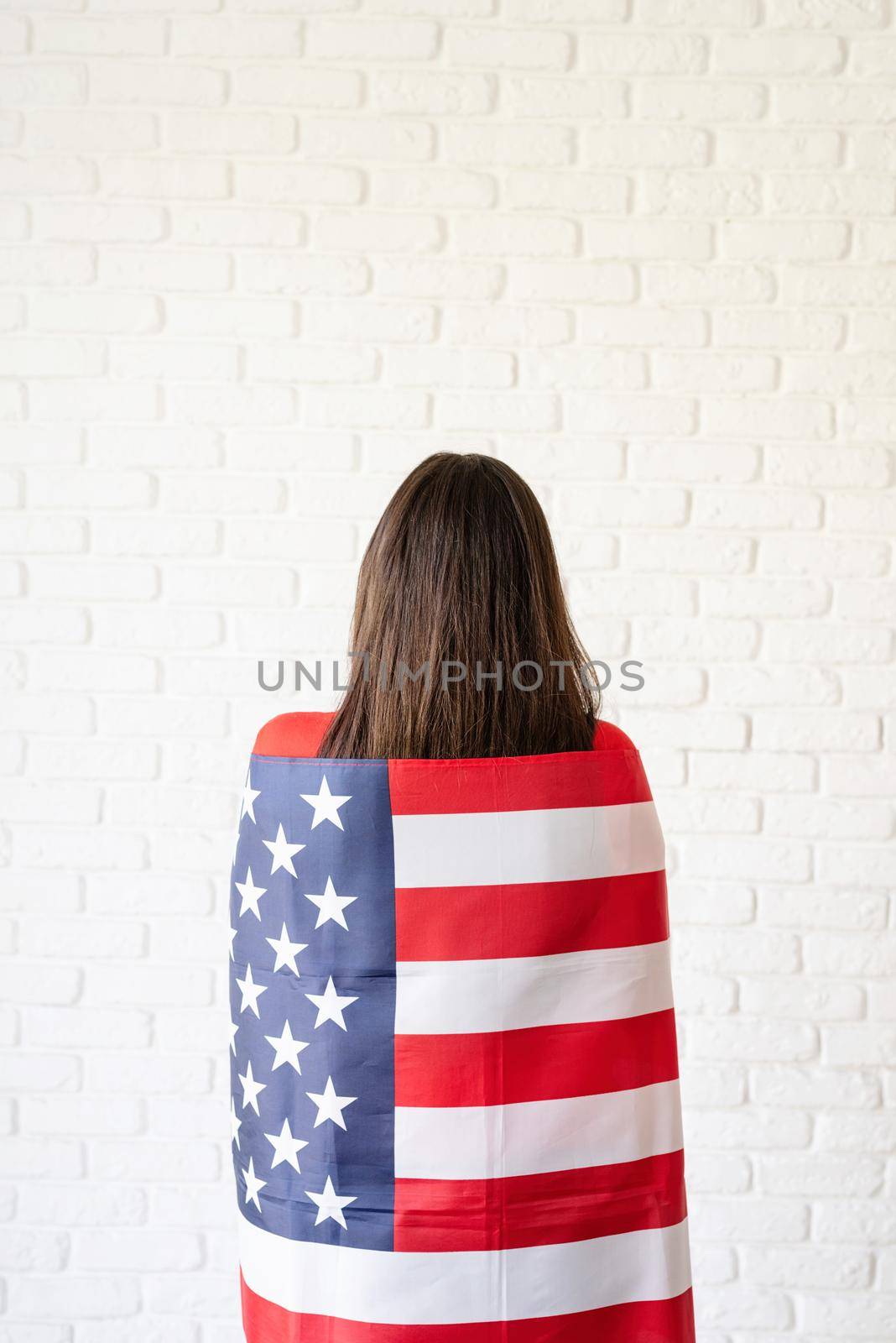 beautiful young woman with american flag, rear view by Desperada