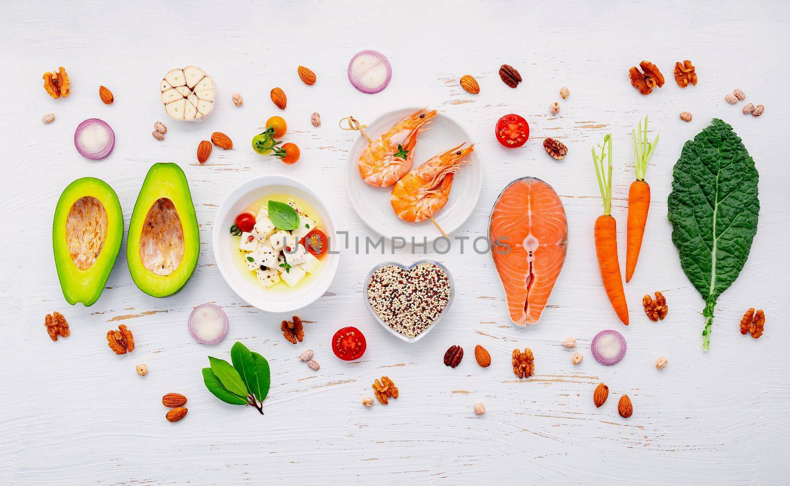 Ketogenic low carbs diet concept. Ingredients for healthy foods selection set up on white wooden background.