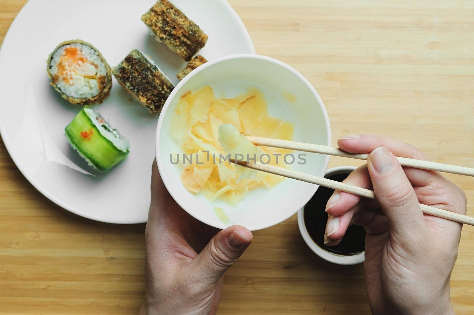 Japanese kitchen. Set of Japanese sushi and rolls. Food sticks.