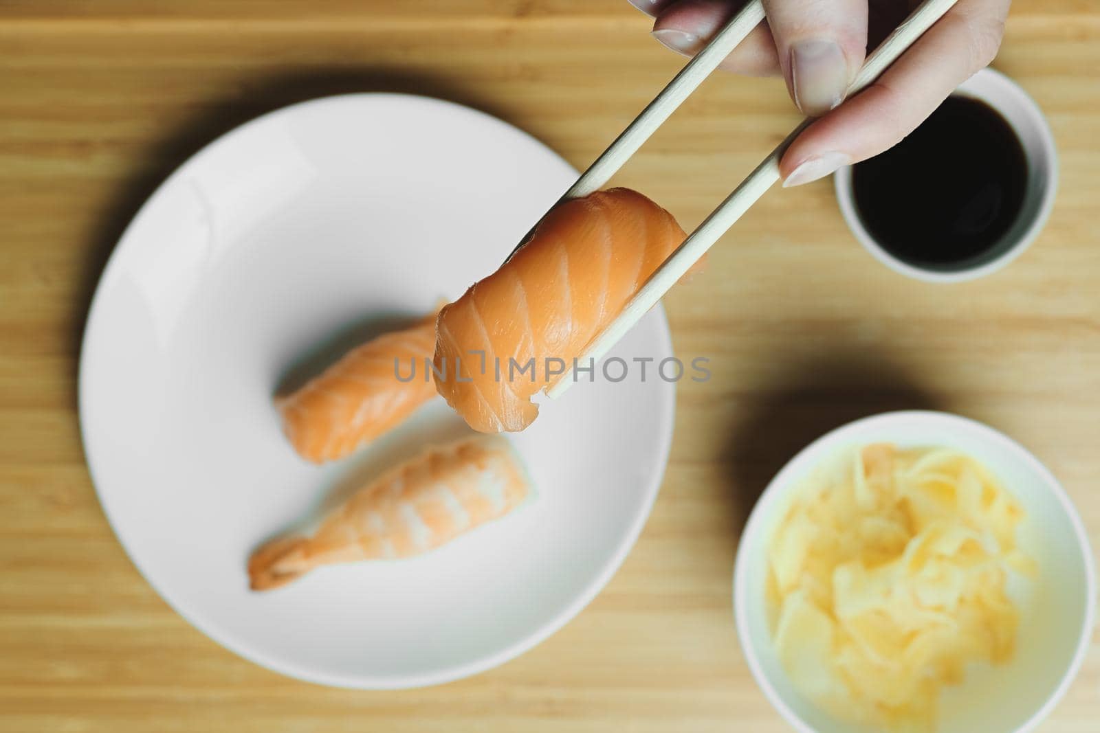 Japanese kitchen. Set of Japanese sushi and rolls. Food sticks.