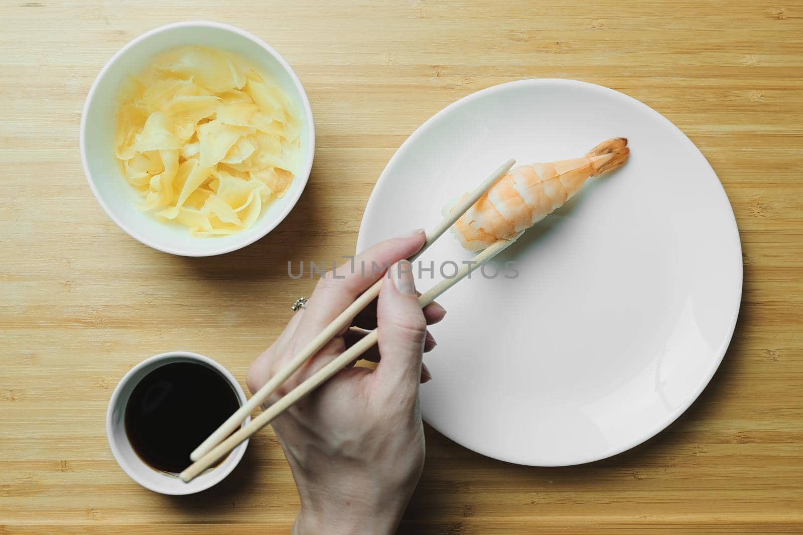 Japanese kitchen. Set of Japanese sushi and rolls. Food sticks.