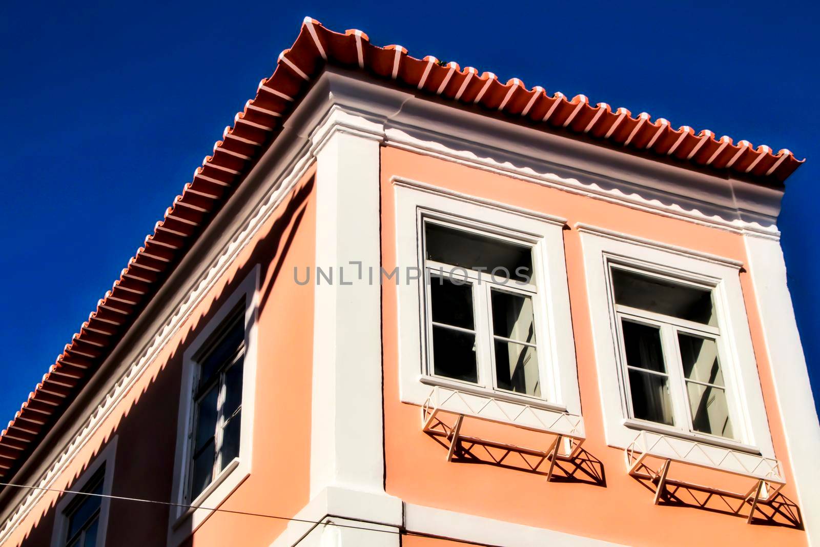 Beautiful and old colorful typical facade next to the water canal in Aveiro village in January