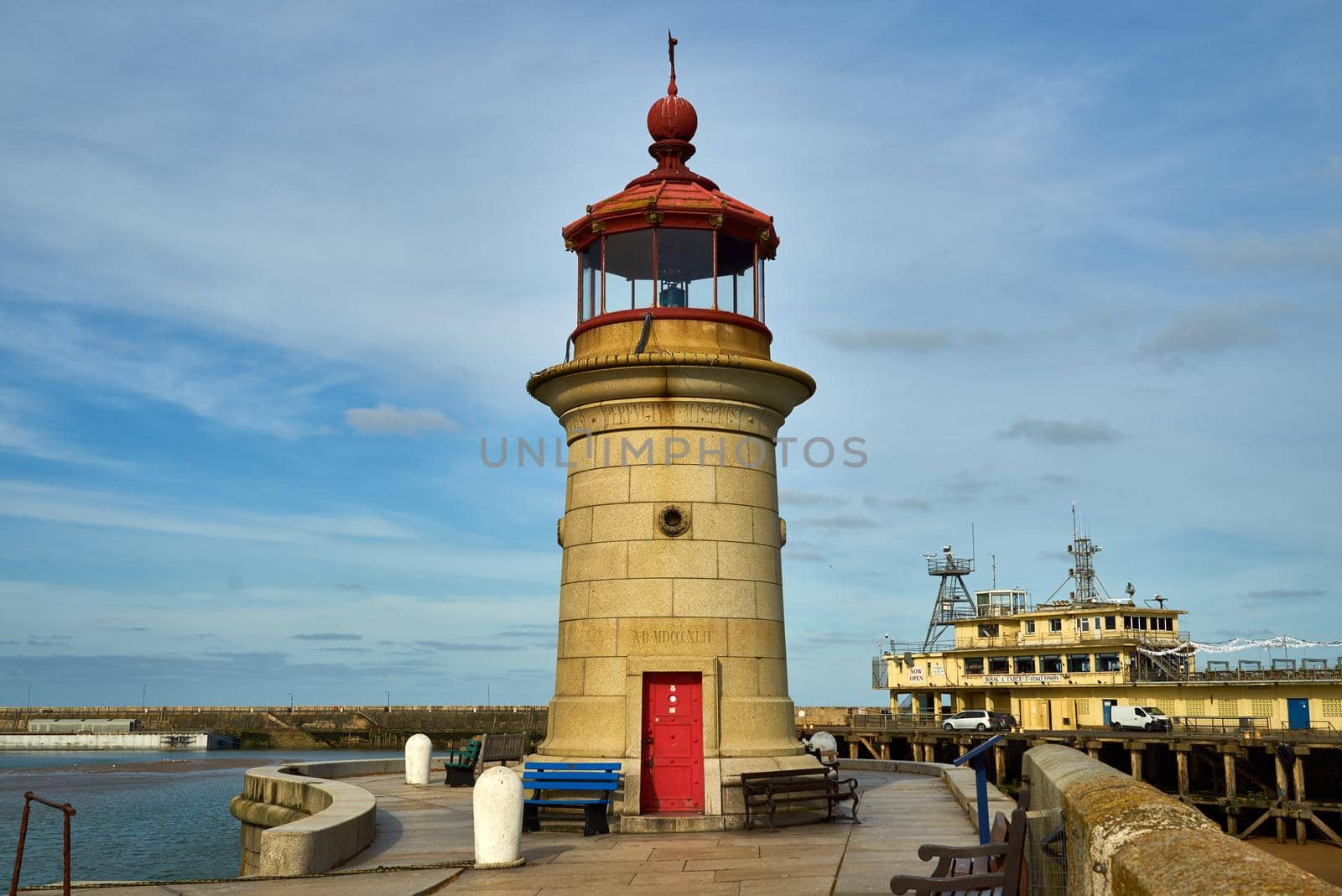 The granite lighthouse was built in 1842 by John Shaw according to John Smeaton's design. The lighthouse stands on the West Pier of the Royal Harbour with the words perfugium miseris carved into the stone, translates to Refuge for the Unfortunate.