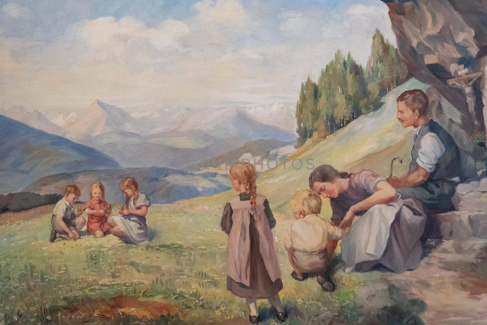 Family image that stands on mountain meadows, horizontal image