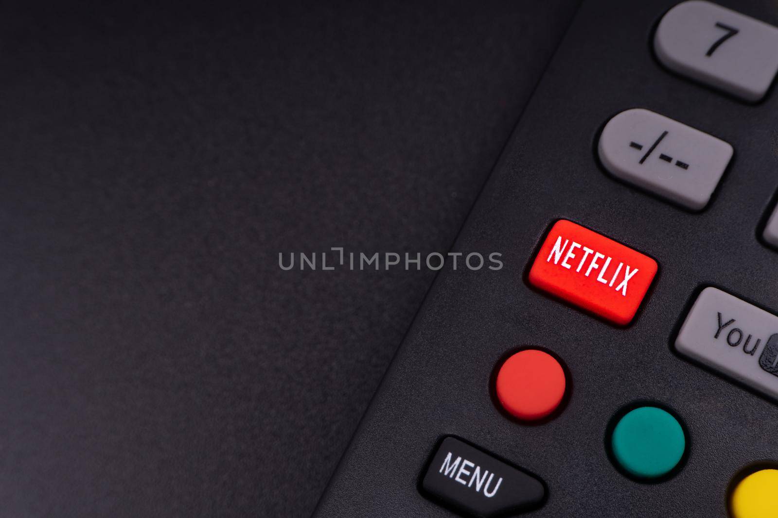 NETFLIX television remote controller on black background by silverwings