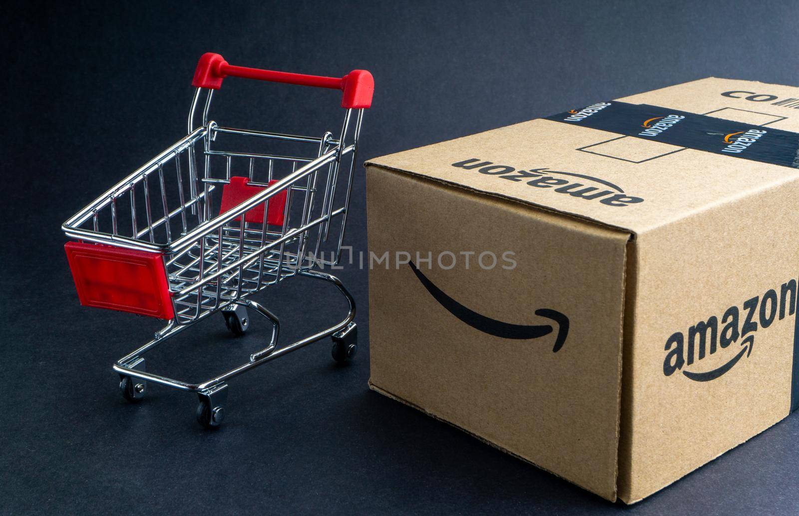 Amazon Prime box or Amazon shipping box on black background by silverwings