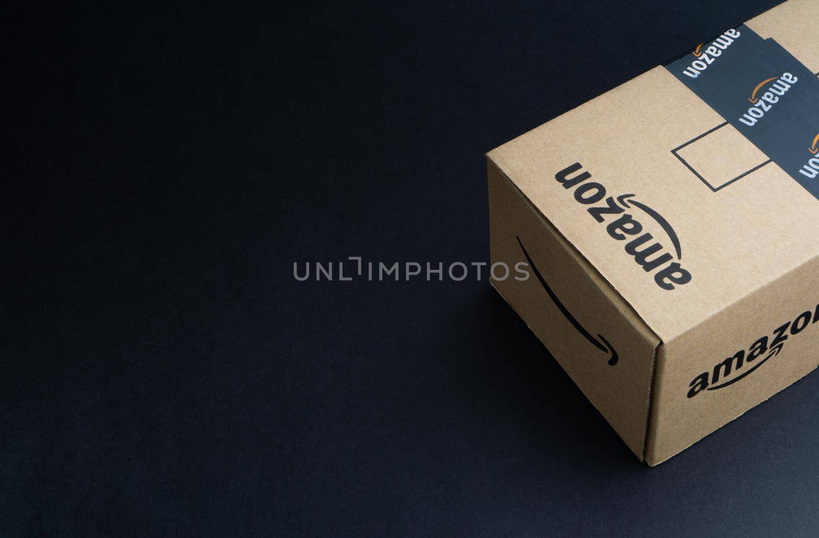 Amazon Prime box or Amazon shipping box on black background by silverwings