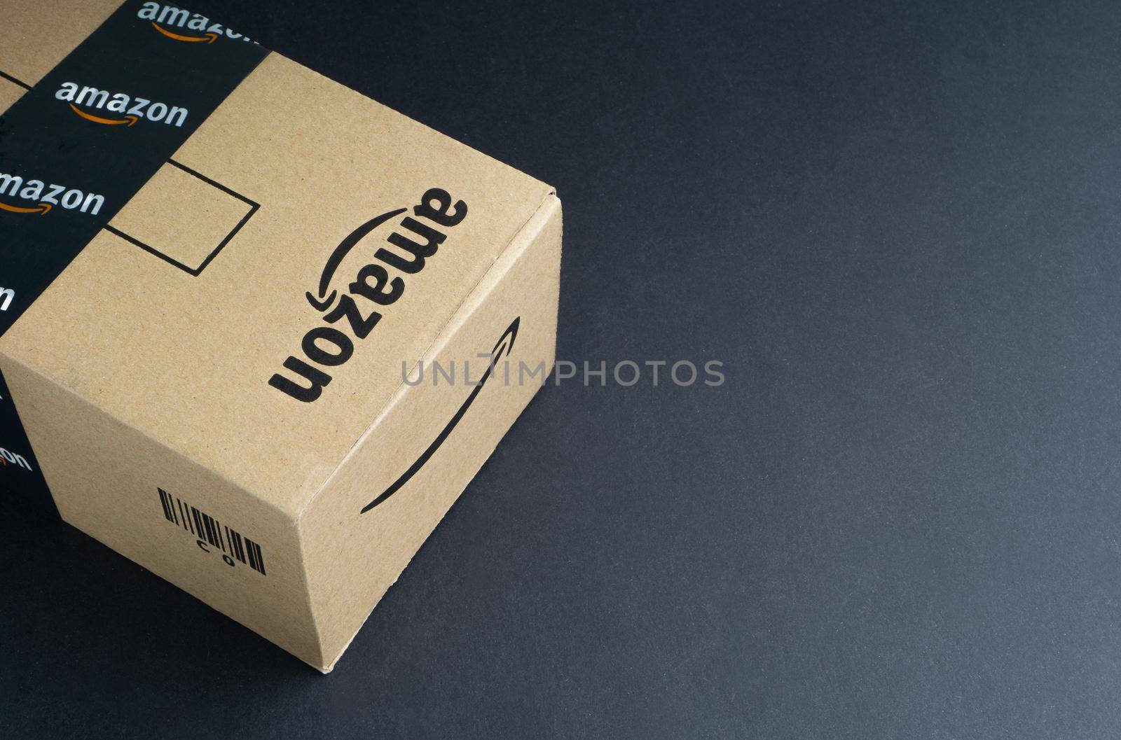 Amazon Prime box or Amazon shipping box on black background by silverwings