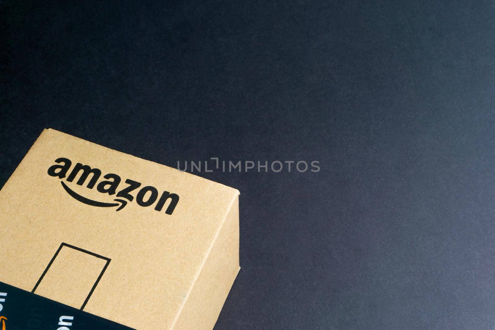 Amazon Prime box or Amazon shipping box on black background by silverwings