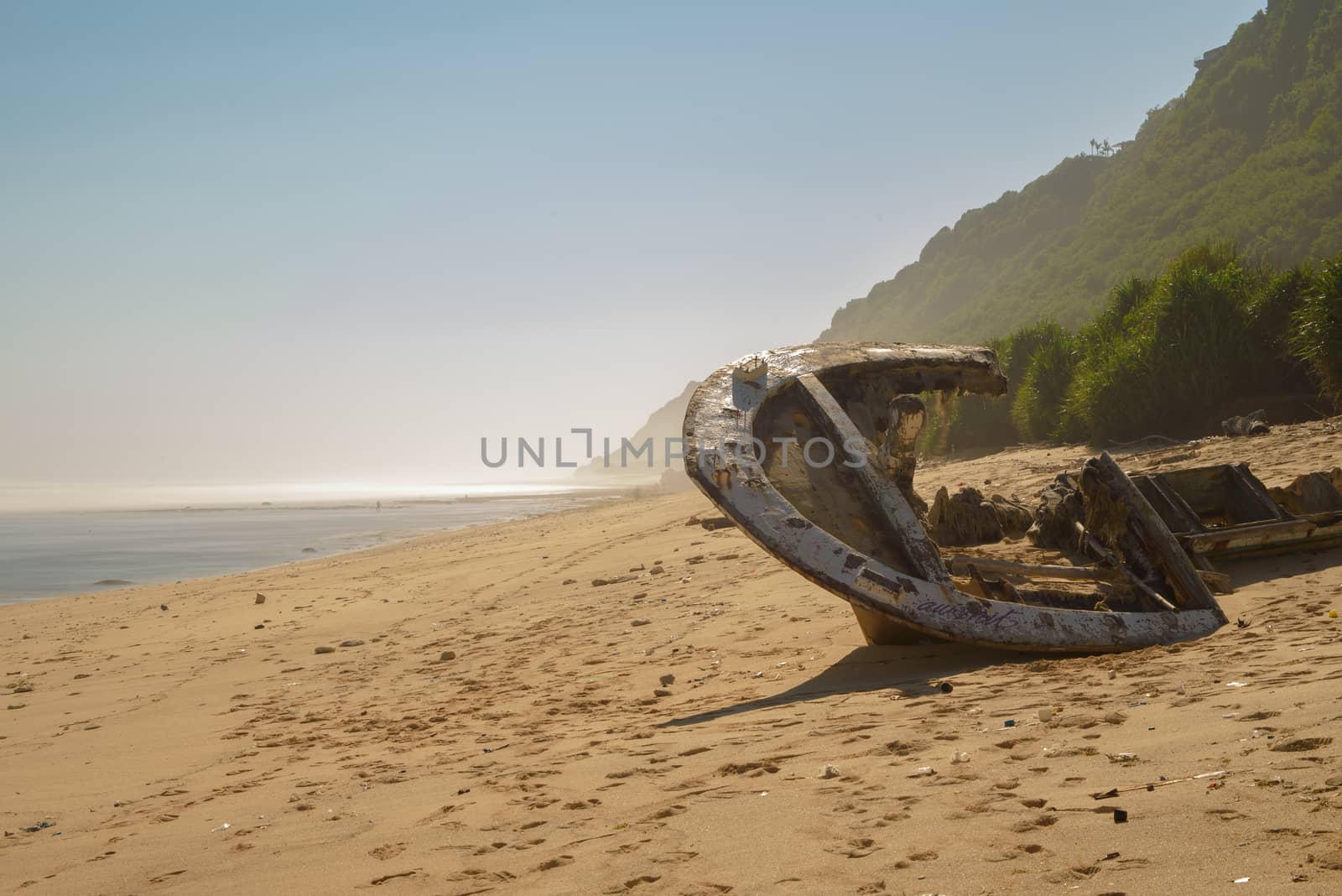 Sunken ship on the shores of Nyang Nyang Beach in Bali, Indonesia.