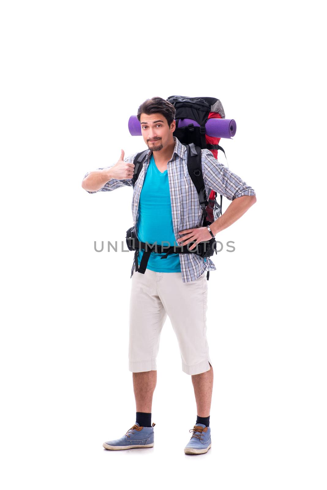 Backpacker with large backpack isolated on white