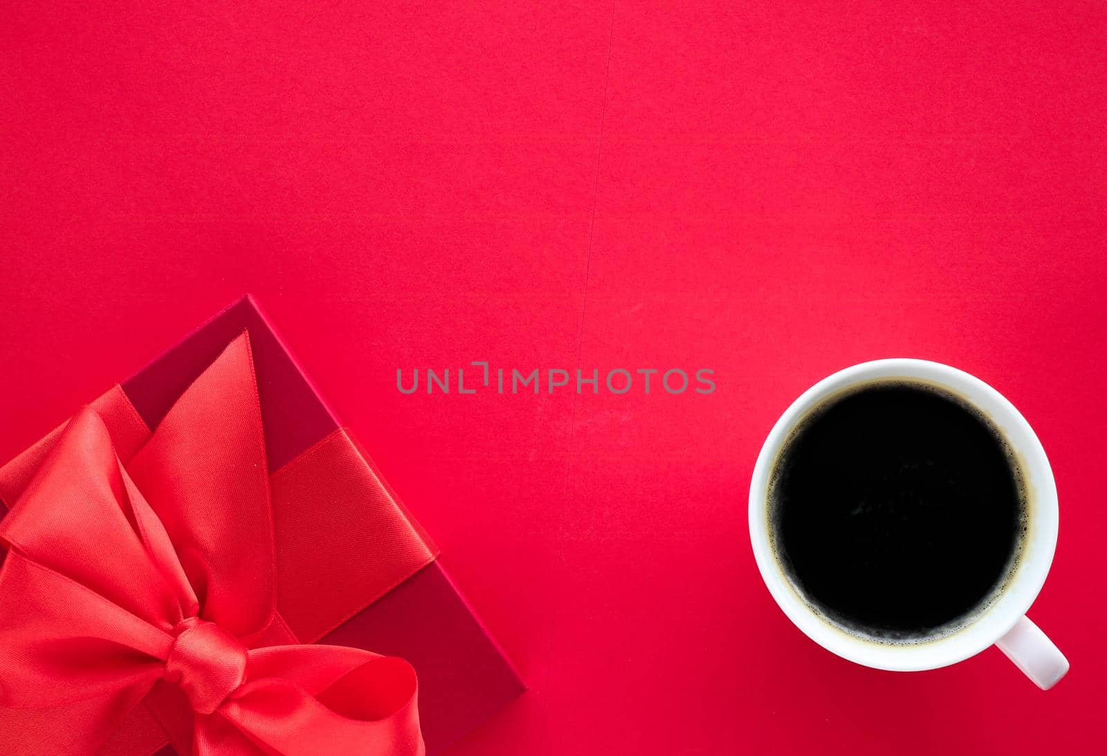 Romantic celebration, lifestyle and birthday present concept - Luxury beauty gift box and coffee on red, flatlay