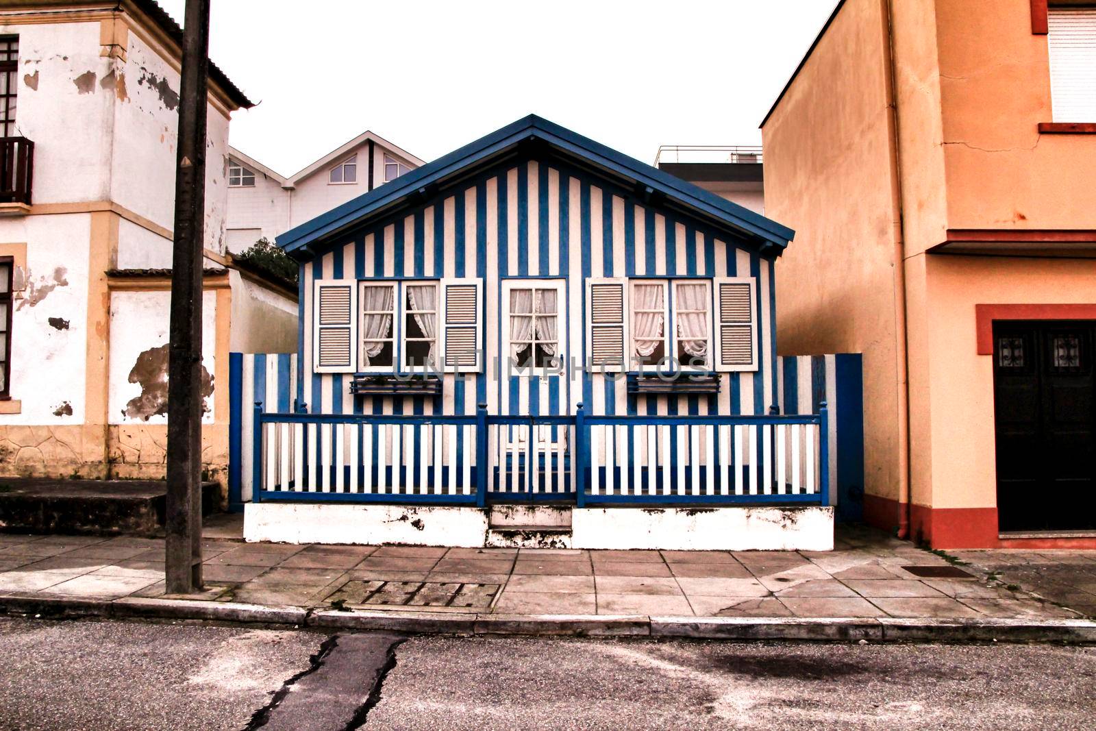 Beautiful and colorful striped facades in Costa Nova beach in Aveiro, Porto, Portugal.