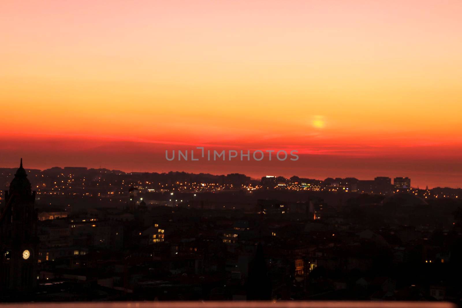 Beautiful view of the city of Porto at sunset from the attic of a building