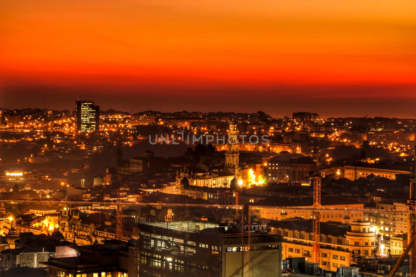 Beautiful view of the city of Porto at sunset from the attic of a building