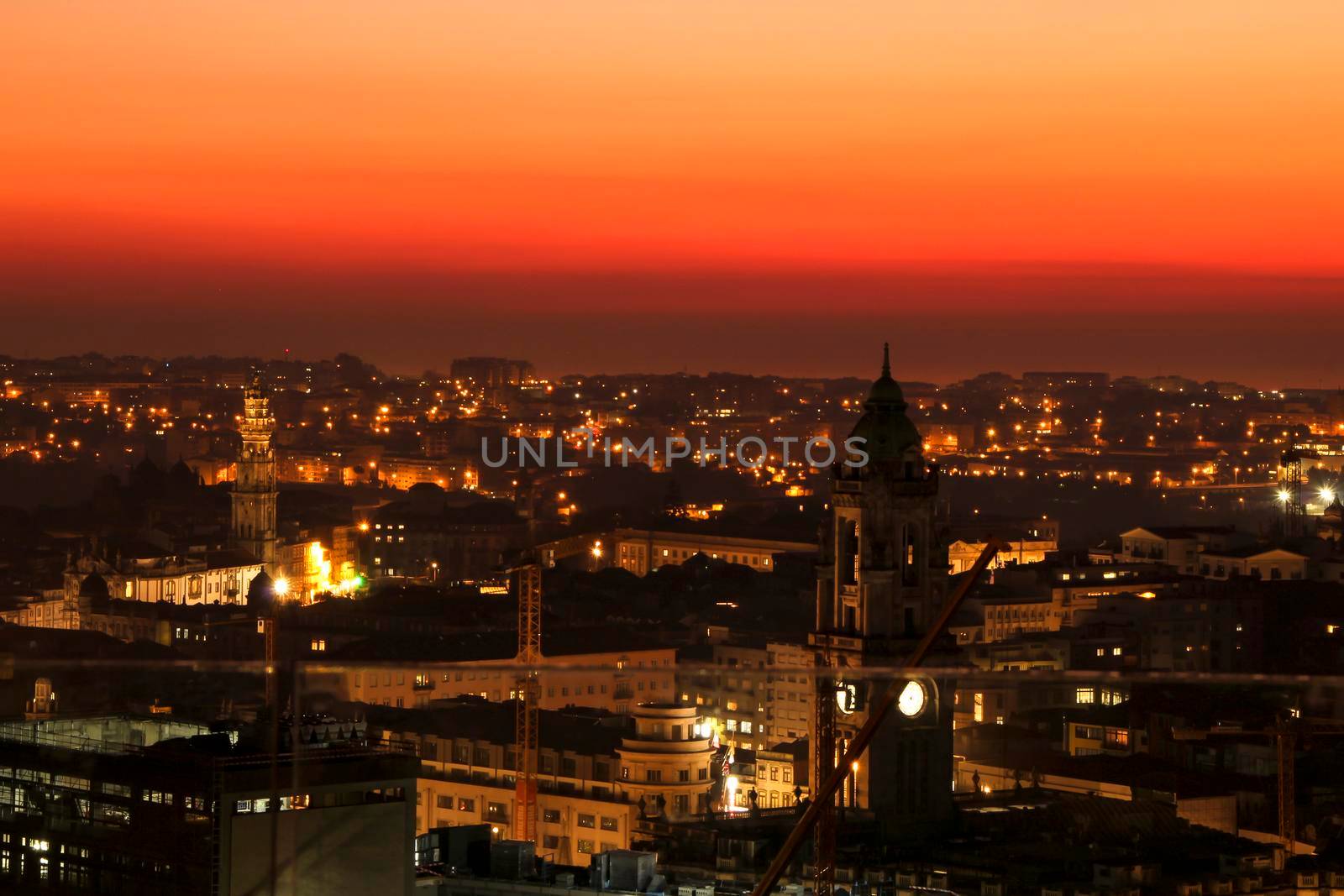 Beautiful view of the city of Porto at sunset from the attic of a building
