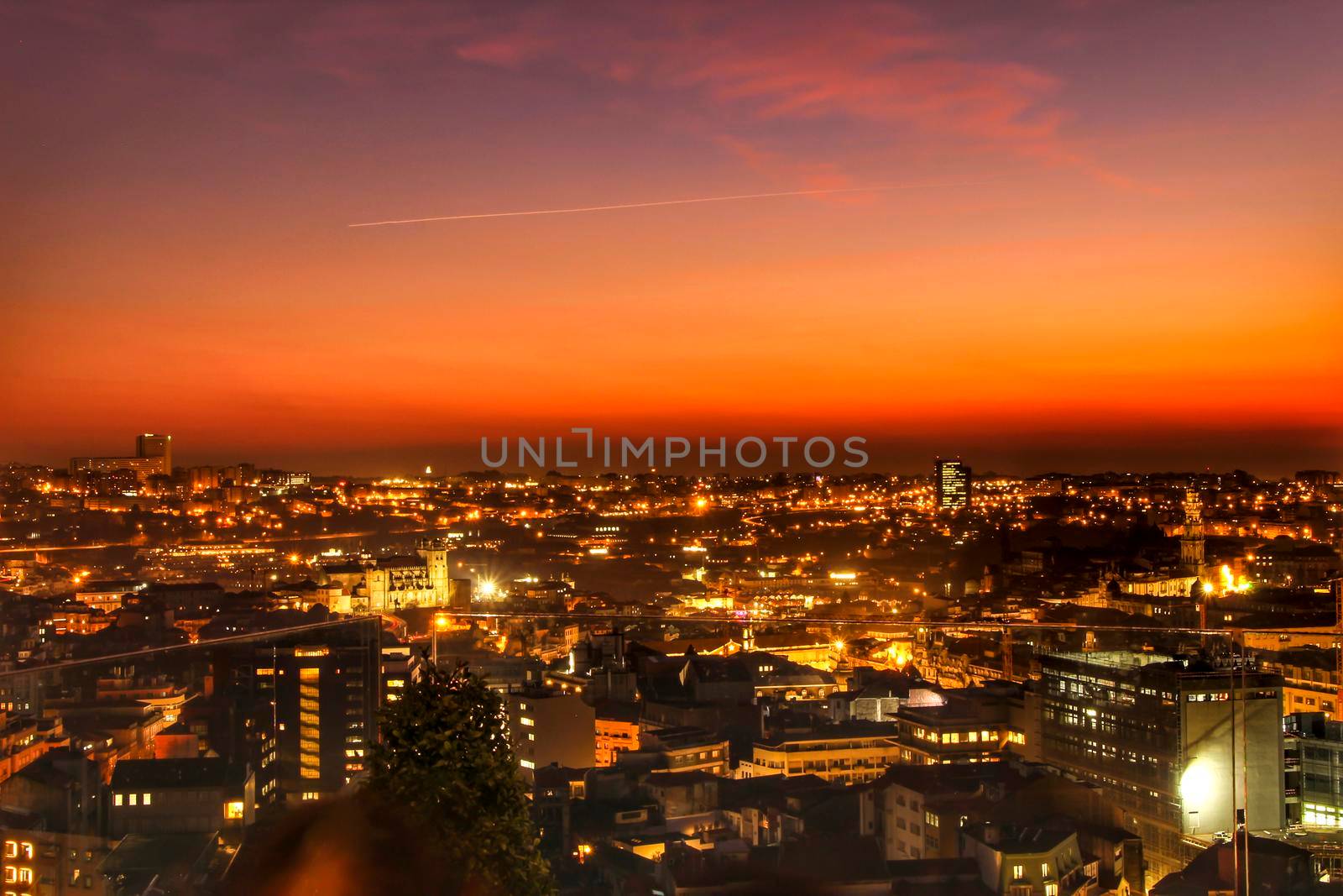 Beautiful view of the city of Porto at sunset from the attic of a building