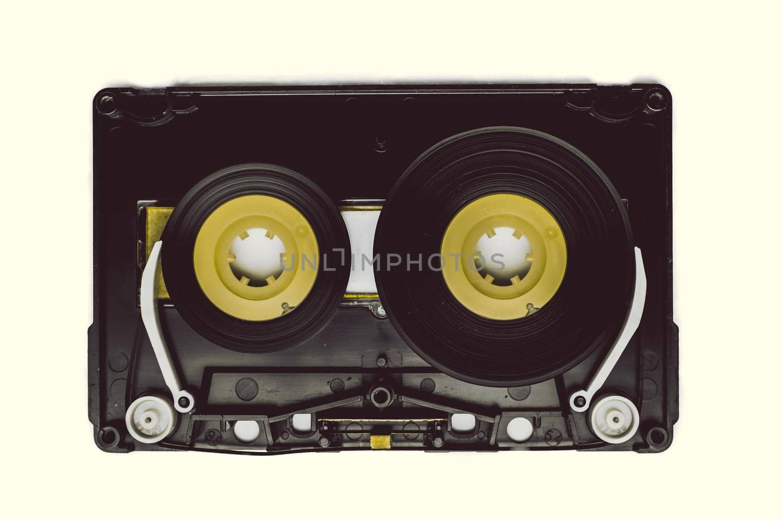 black old audio cassette tape open