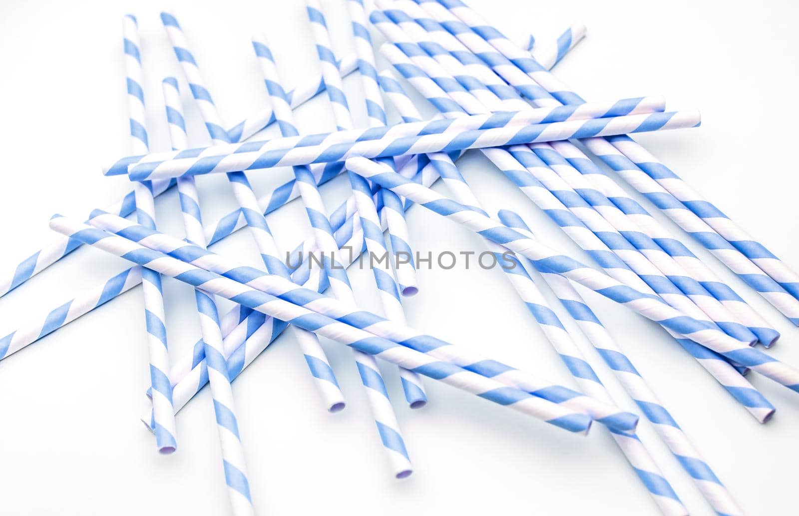 red striped drinking straws isolated on white background