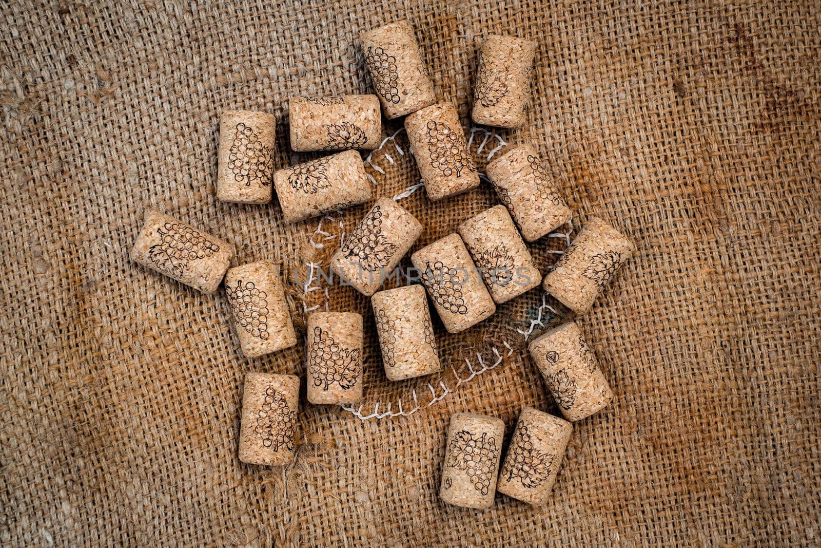 wine corks on jute sack by Roberto