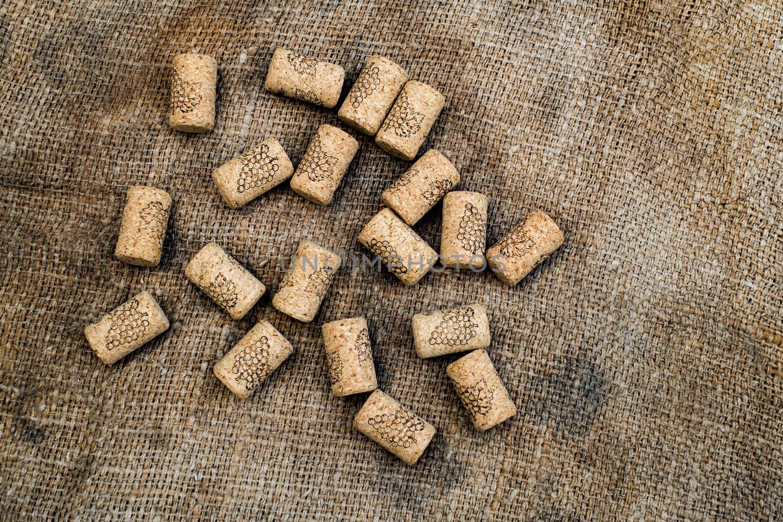 wine corks on jute sack by Roberto