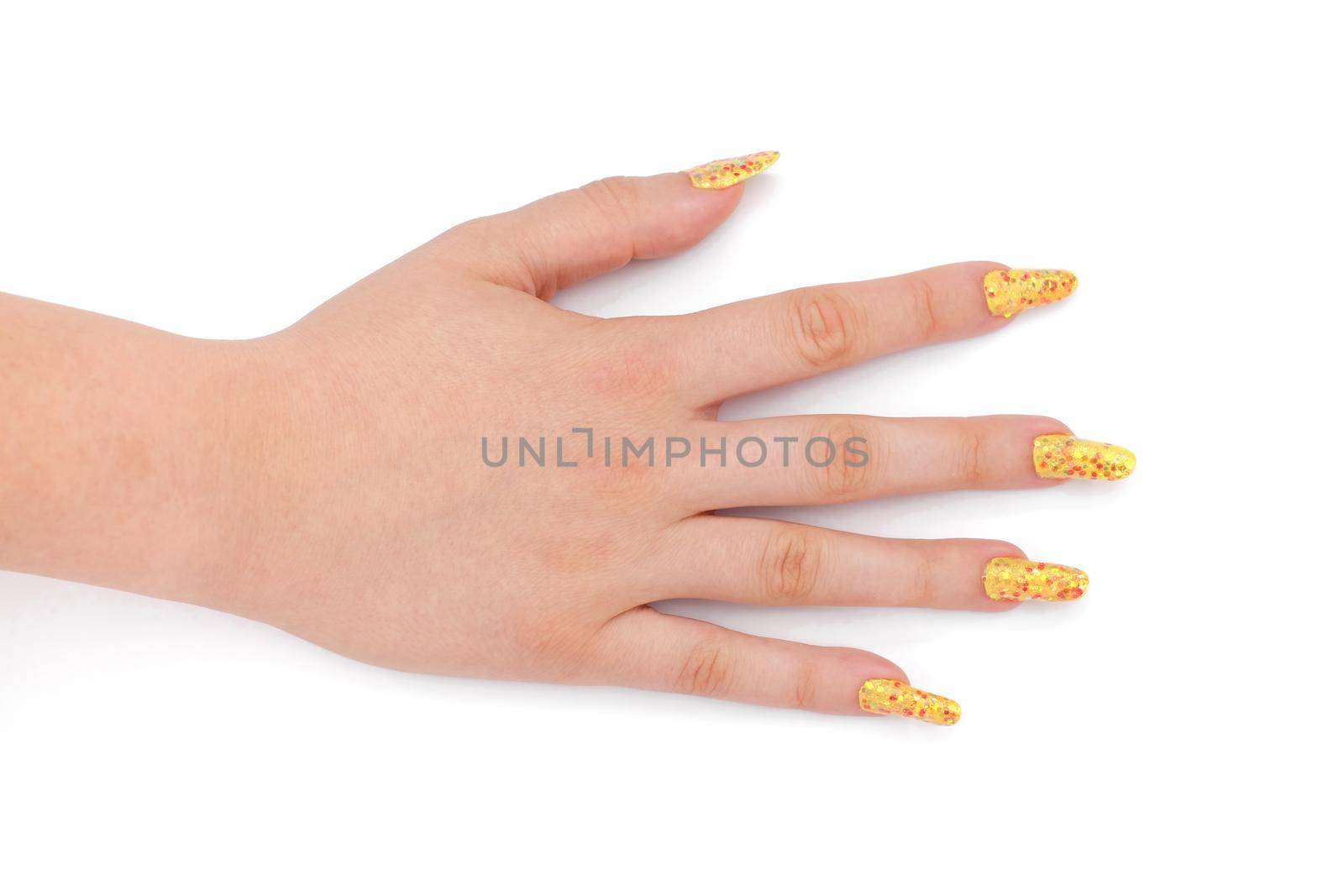 young girls hand with nailart on white