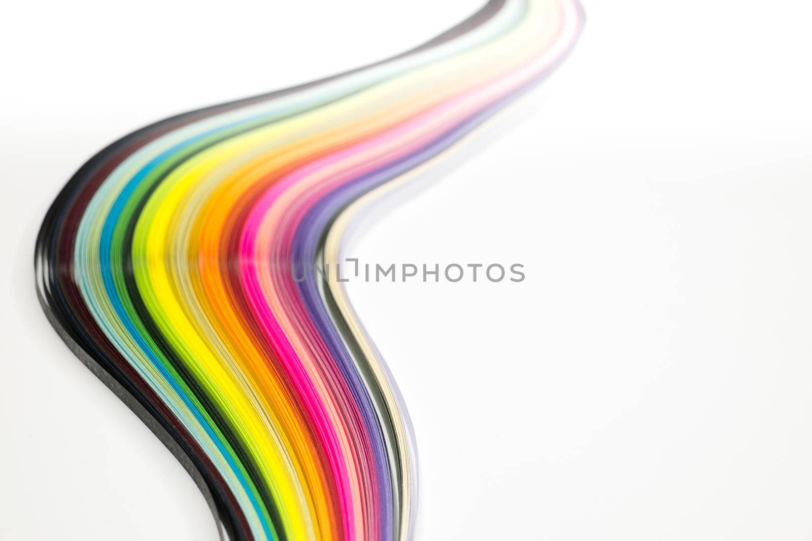 Abstract color wave curl rainbow strip paper on white background