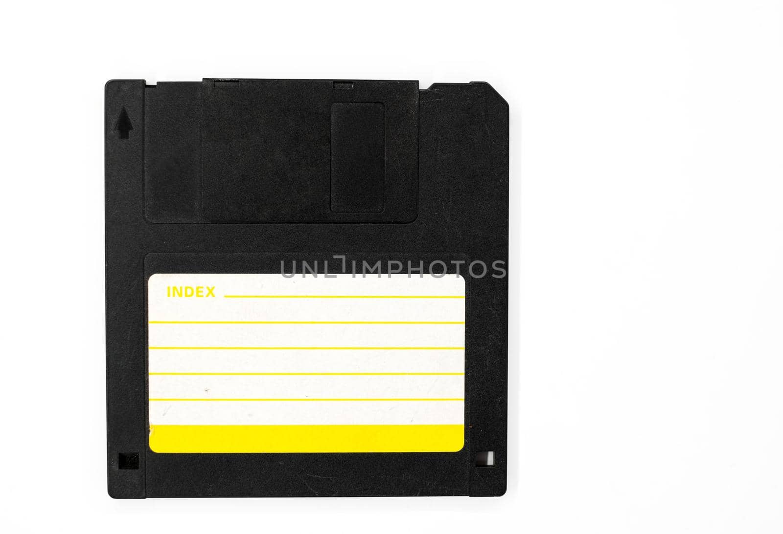 Black floppy disk with blank label on white background