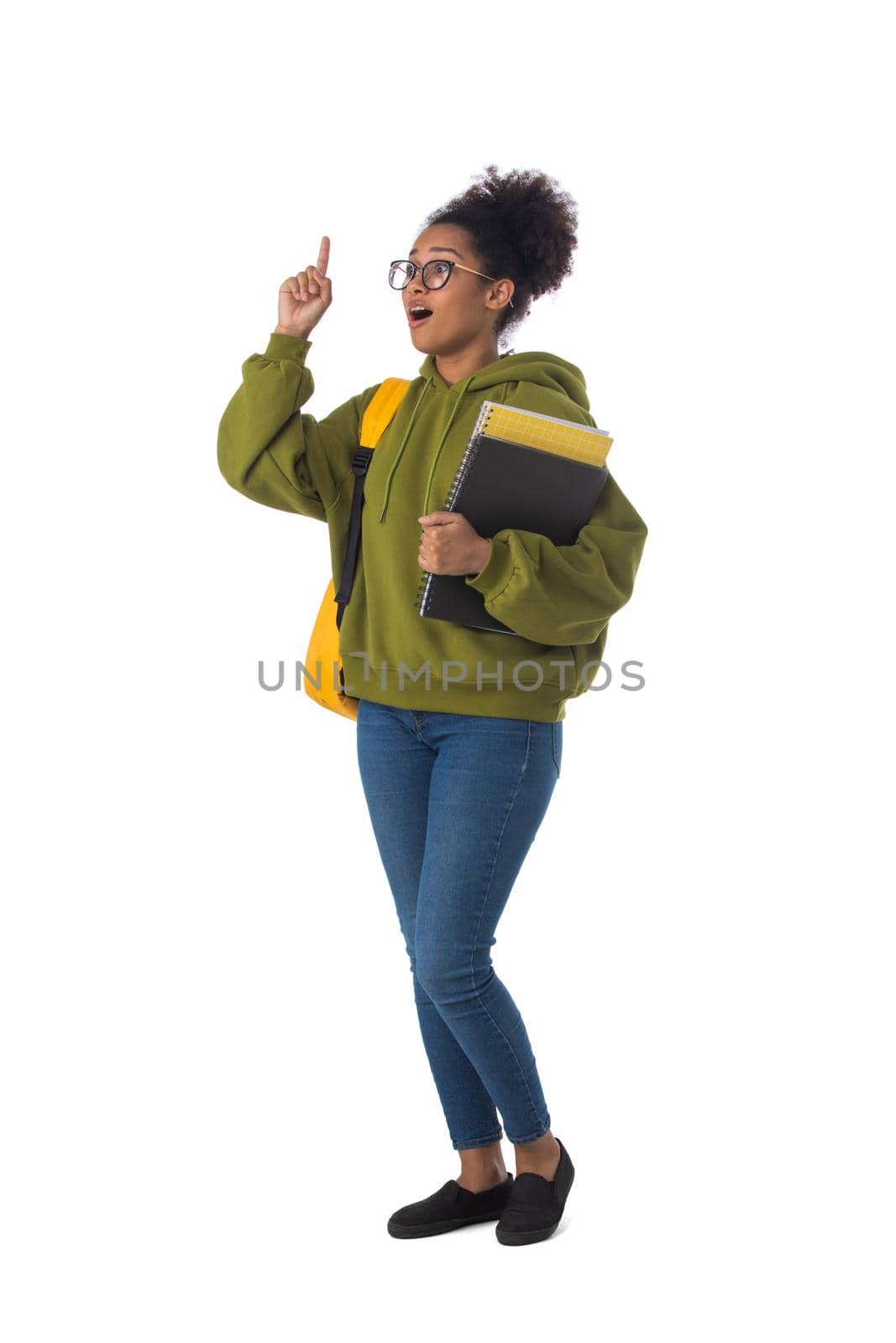 Full length portrait of pretty female african american university student pointing his finger up isolated on white background