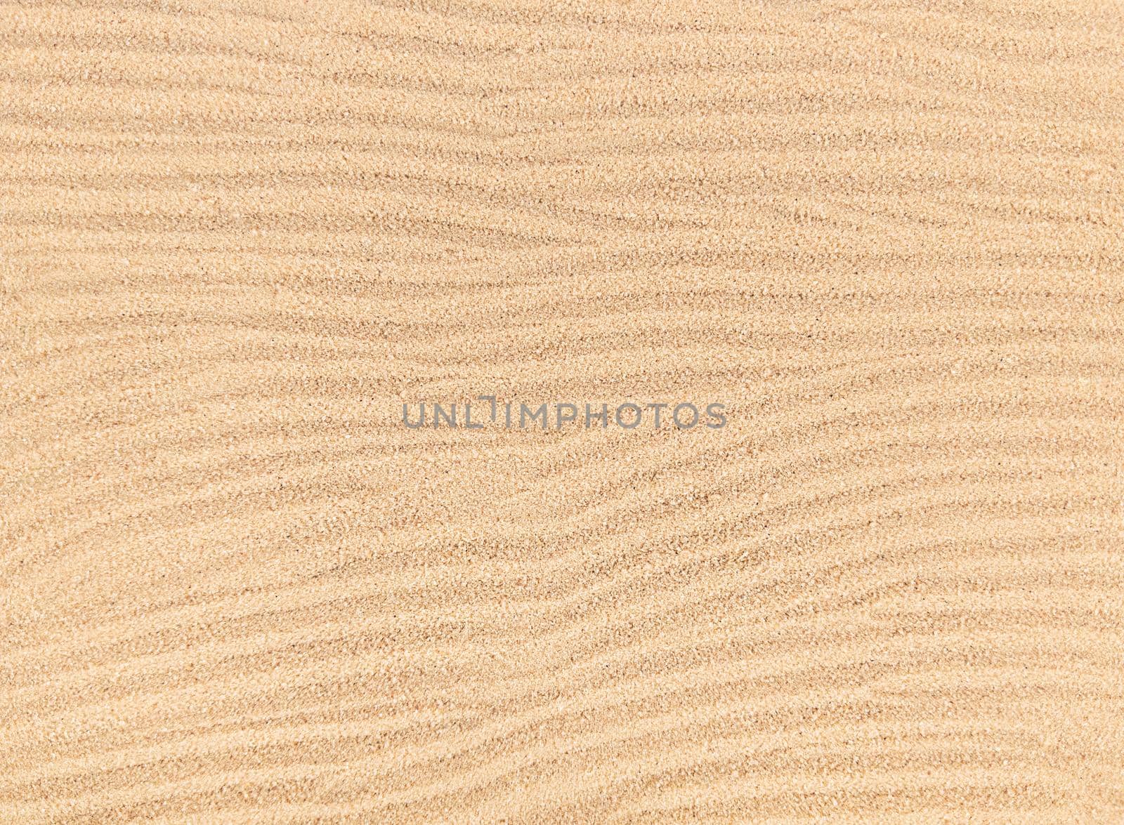 Sand waves texture background, beach top view. by anna_artist