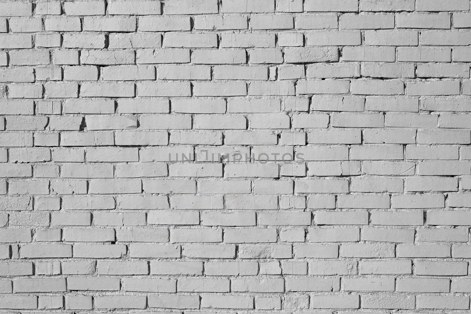 Background of wide white brick wall texture. Old brick wall stone textured, wallpaper abstract wall. Home or office design backdrop.