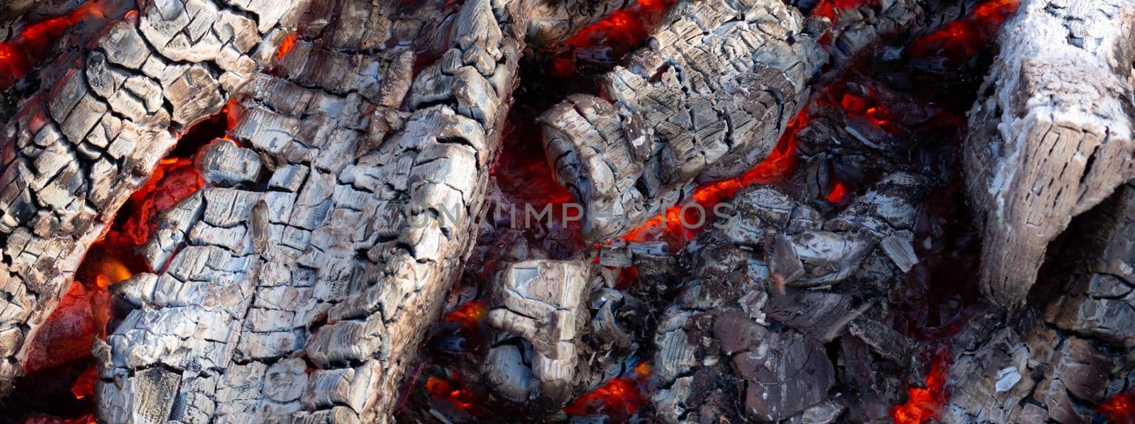 Glowing red hot charcoal. Beautiful charcoal background