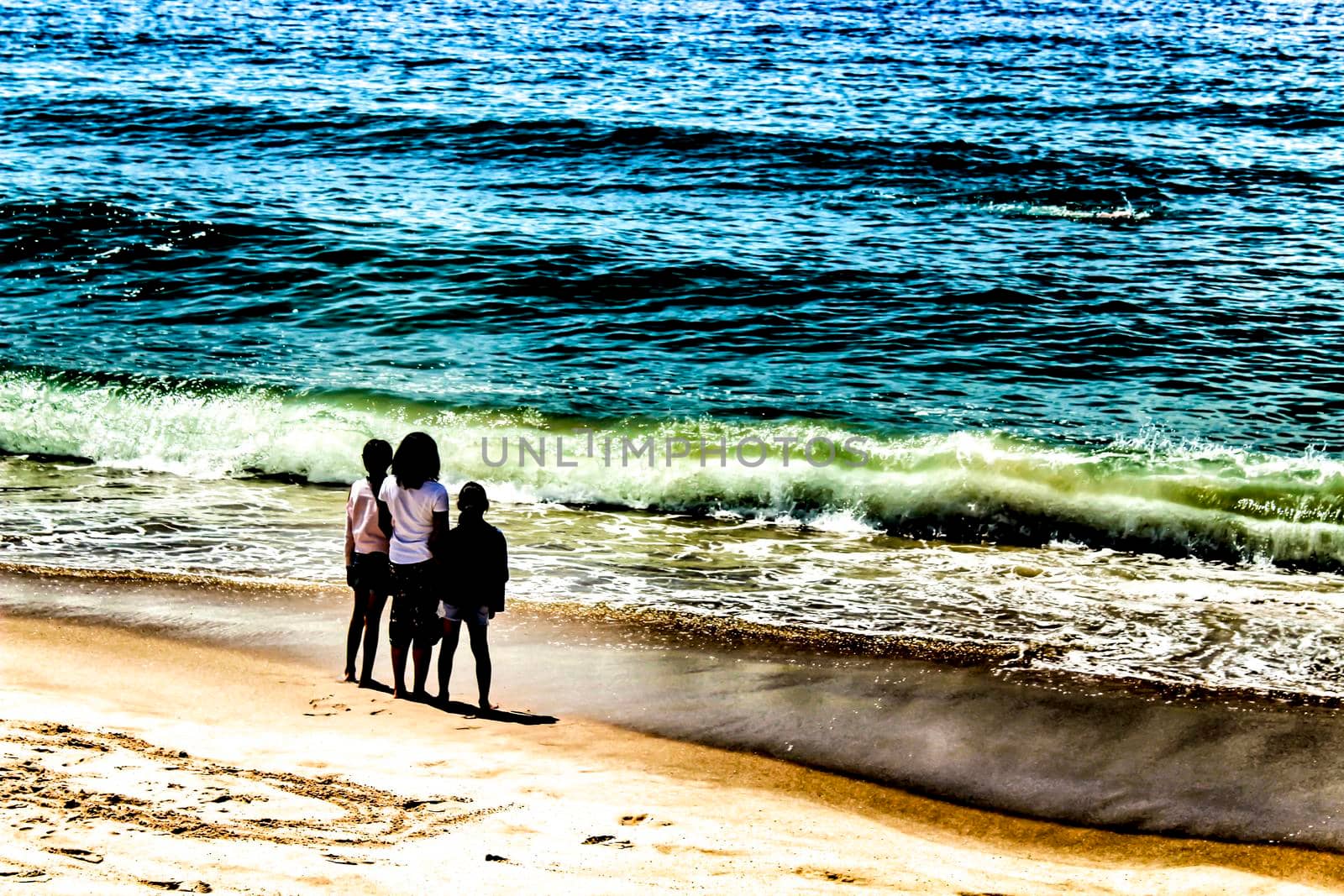 Sesimbra, Lisbon, Portugal- June 1, 2018: Views of the Sesimbra Beach and tourists watching the Atlantic Ocean in a sunny day.