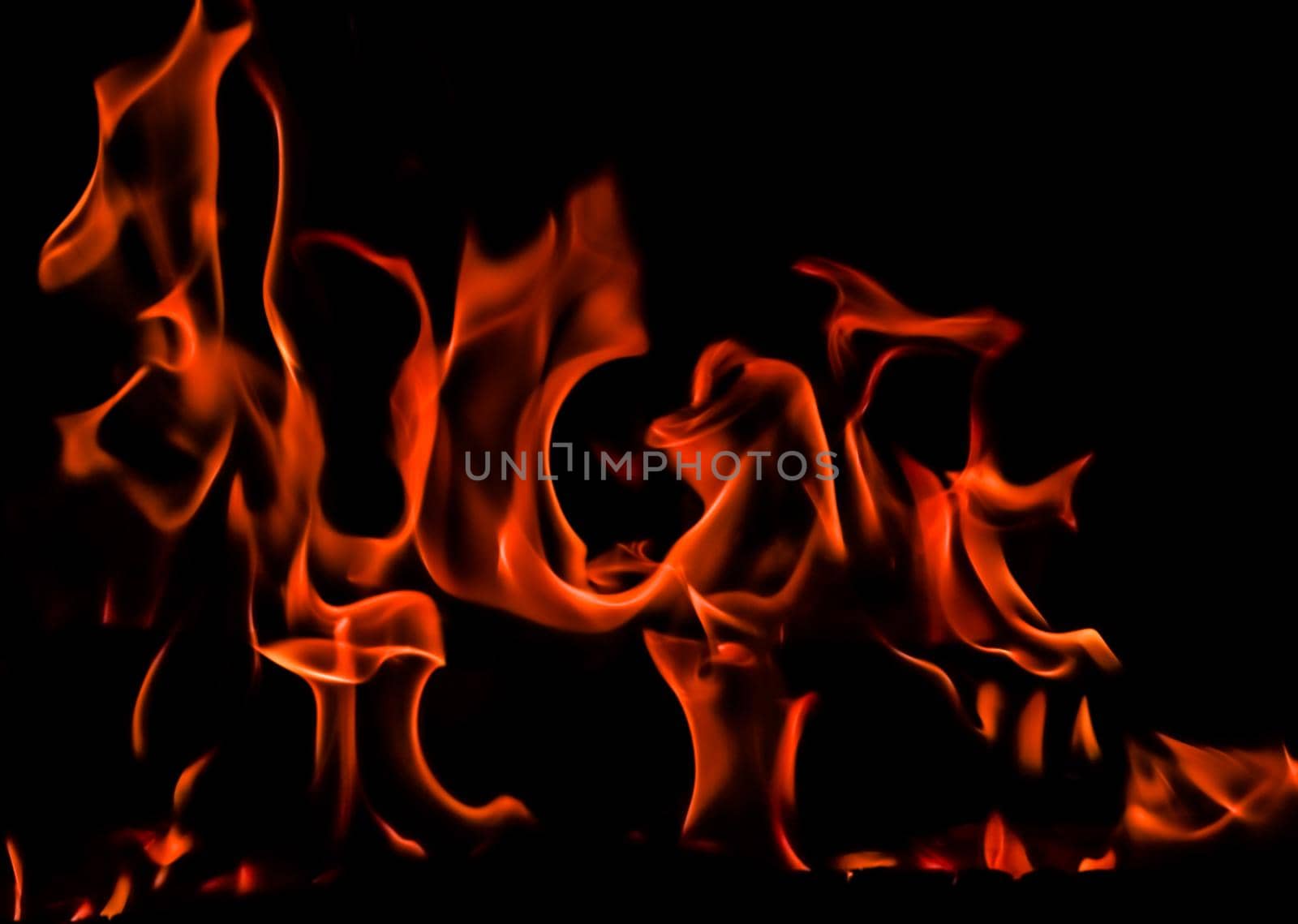 Flames of fire on a black background. Space for copy, text, your words