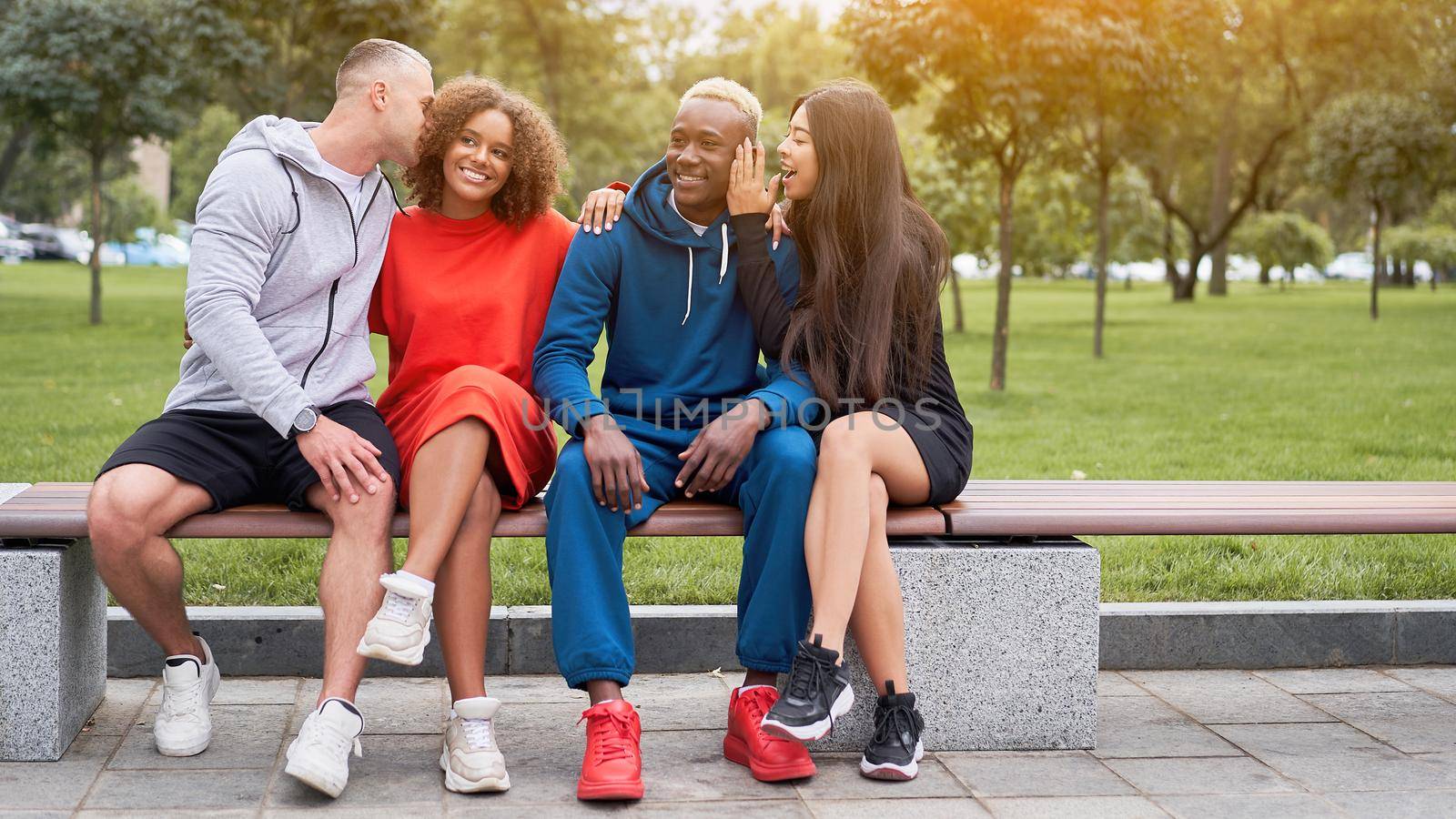 Multi-ethnic group people teenage friends. African-american, asian, caucasian student spending time together Multiracial friendship by andreonegin