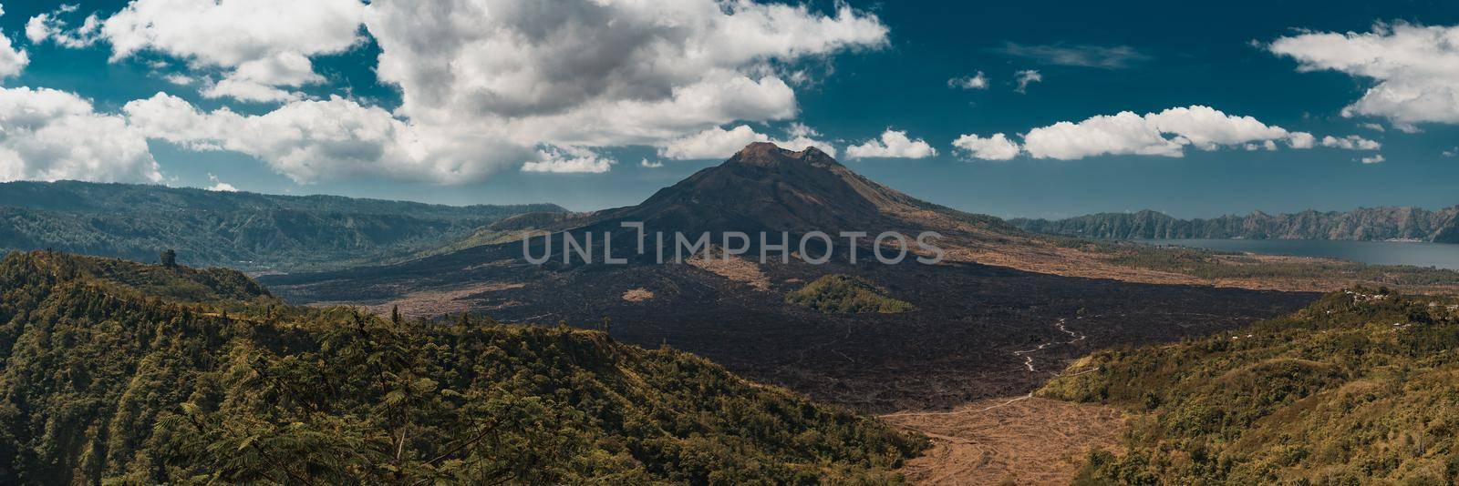 Mount Batur volcano and Agung mountain panoramic view with blue sky from Kintamani, Bali, Indonesia