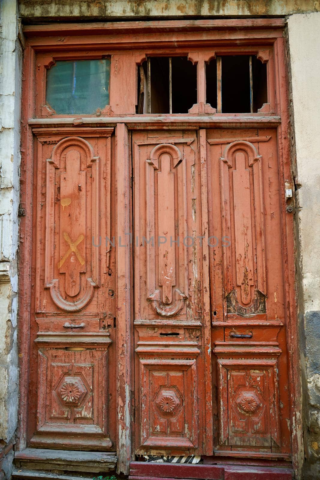 Atmospheric vintage wooden entrance doors. Retro style.