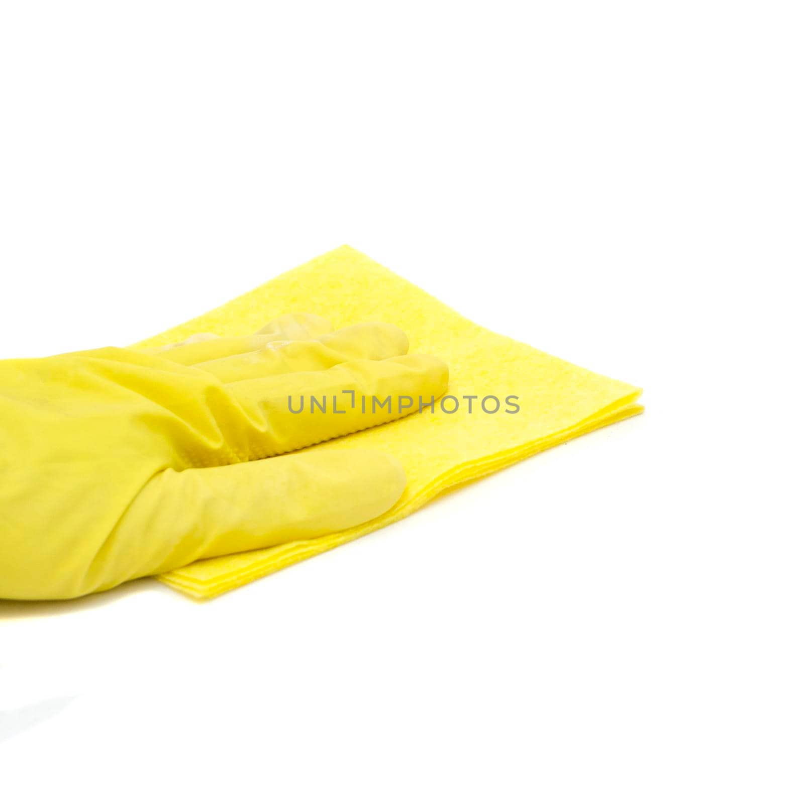 a man's hand in a yellow glove holds yellow cleaning cloth isolated on a white background.