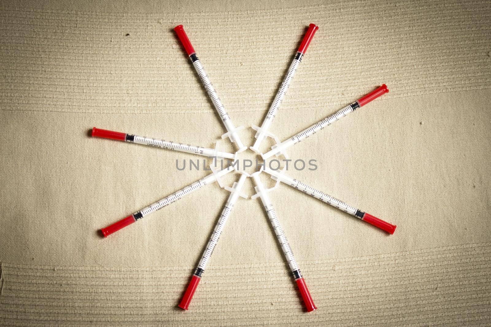 Syringes for injecting insulin in a circle. No people